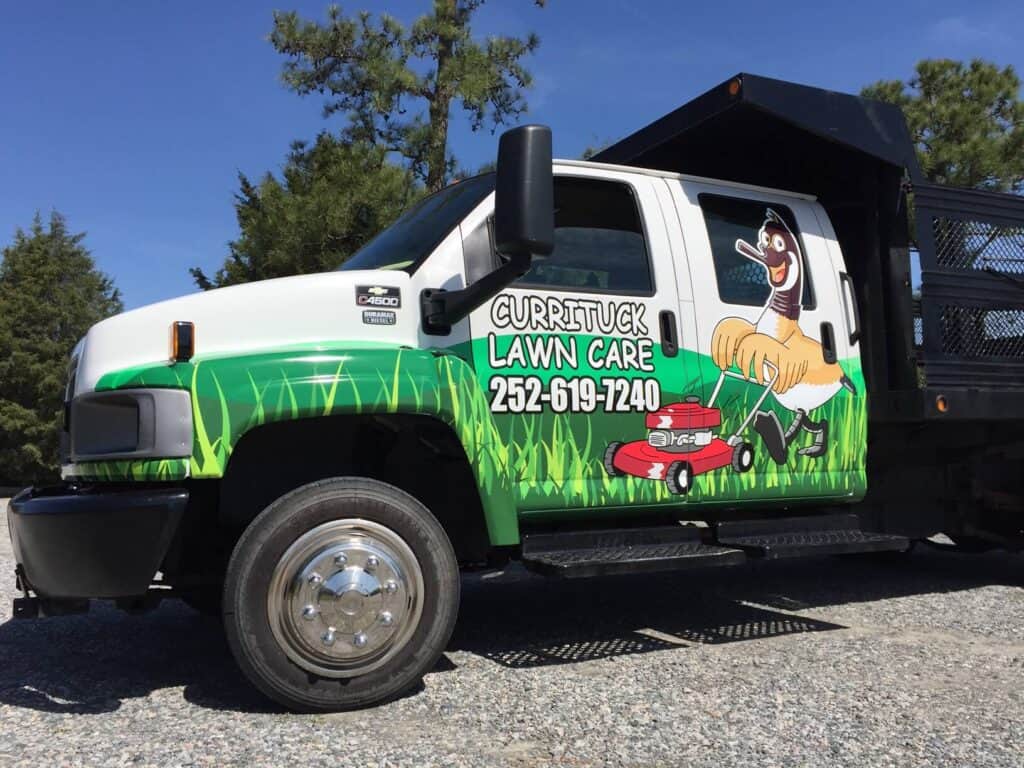 Dump truck wrap for Currituck Lawn Care