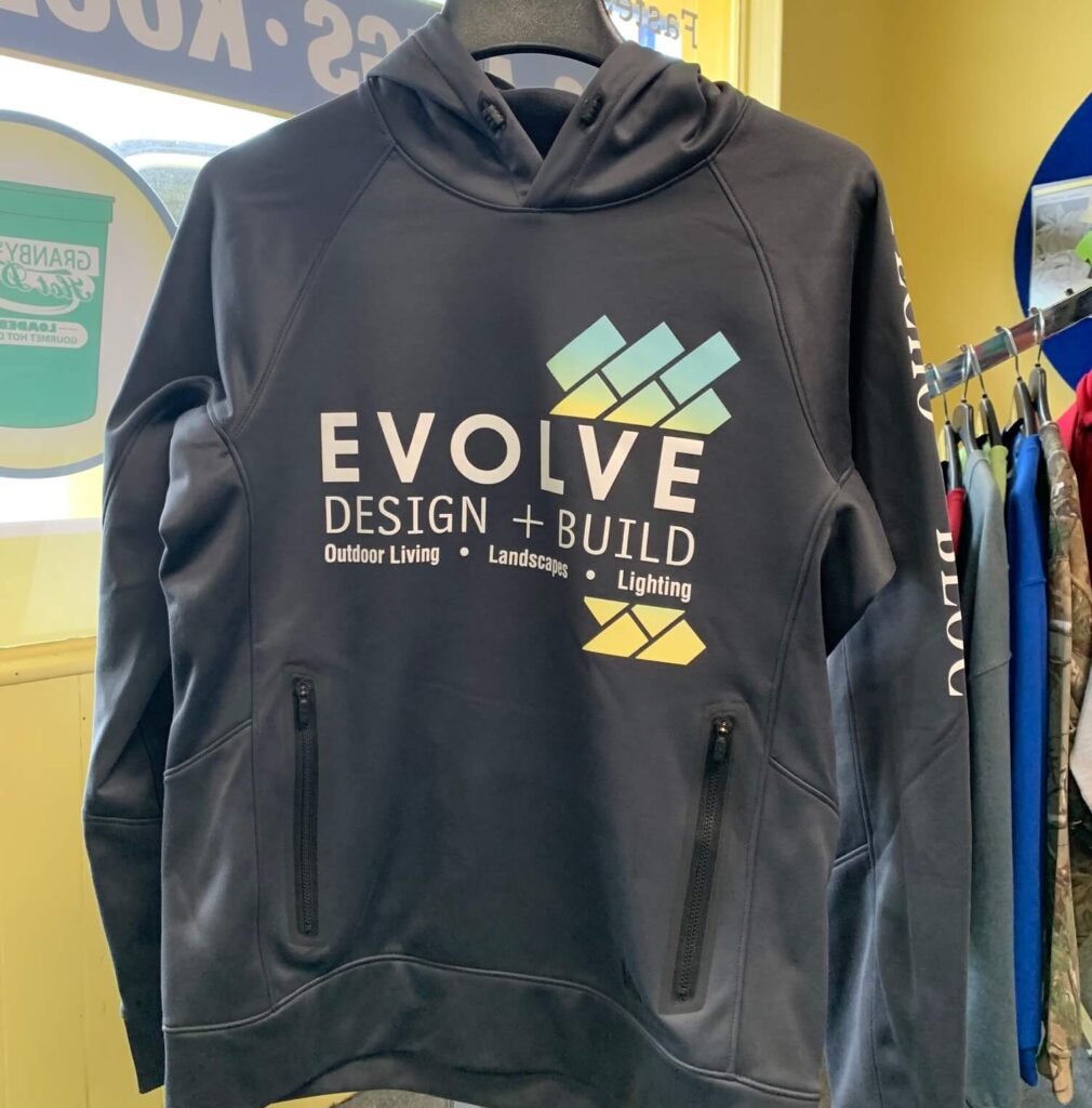 Screen printing on hoodie for Evolve Design and Build