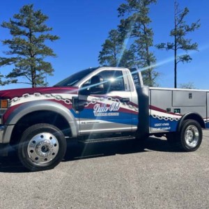 Vehicle wrap for F450 wrecker truck from DeSigns, Inc. for signs, banners, wraps, and promotional products.