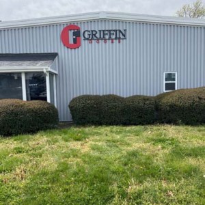Formed plastic letters on building exteriors for Griffin Doors from DeSigns, Inc.