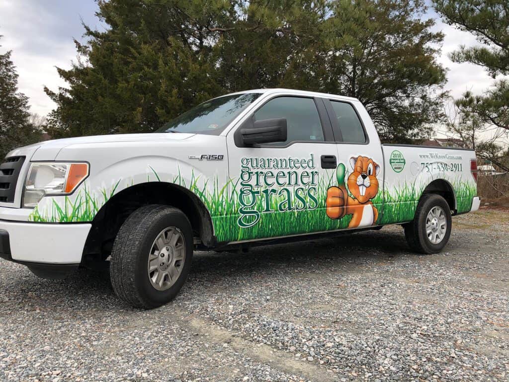 Truck lettering and graphics Guaranteed Greener Grass