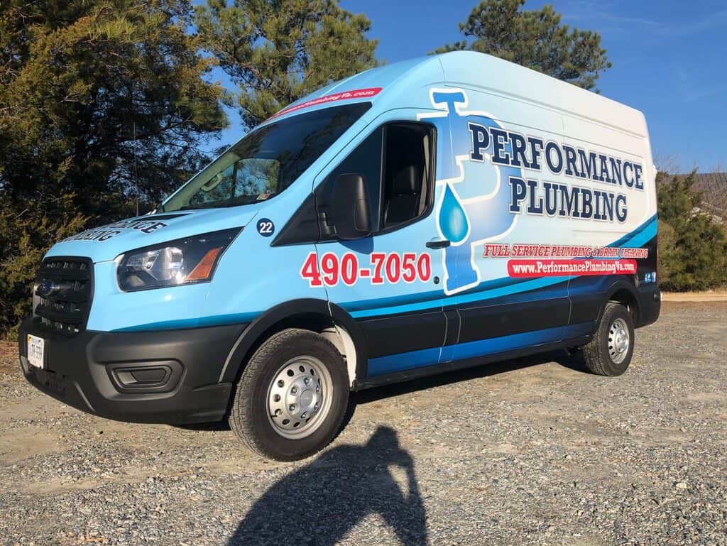 Custom van wrap for Performance Plumbing (front and side view)