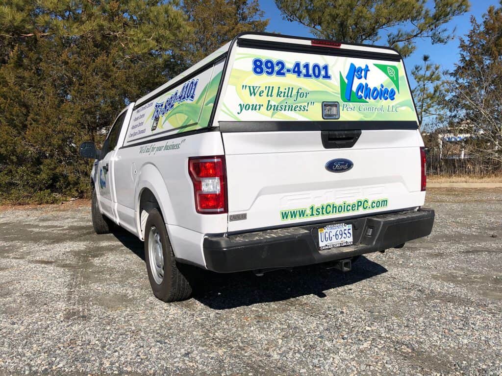 Truck lettering 1st Choice Pest Control (rear view)