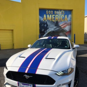 Race car stripes for your car. Get your car partially wrapped at Designs, Inc. Add accents and graphics to your car. We also do window fil,ms and tint.