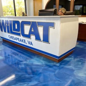 Desk wraps from DeSigns, Inc. for signs, banners, wraps, and promotional products.