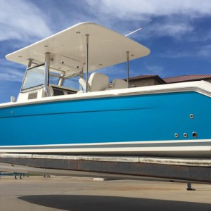 Change the color of your boat and a boat wrap from DeSigns, Inc.