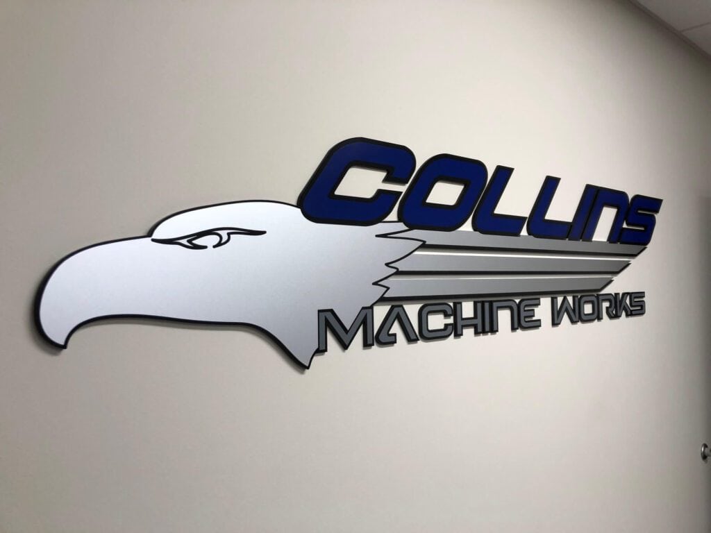 Interior lobby logo sign,  custom painted acrylic letters for Collins Machine Works