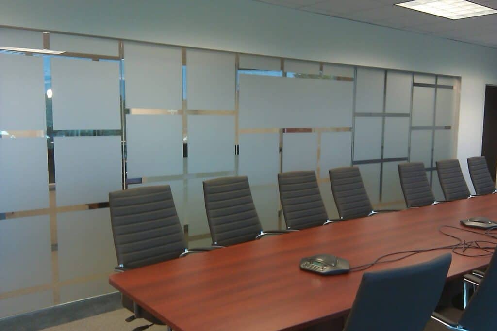Etch glass in corporate conference room