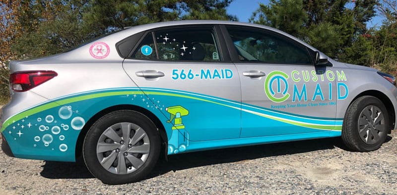 Partial car wrap for Custom Maid Services service vehicle