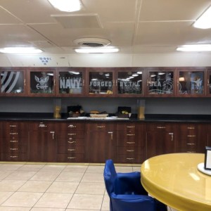 Etch glass on cabinets in mess hall for U.S. Navy by DeSigns, Inc.