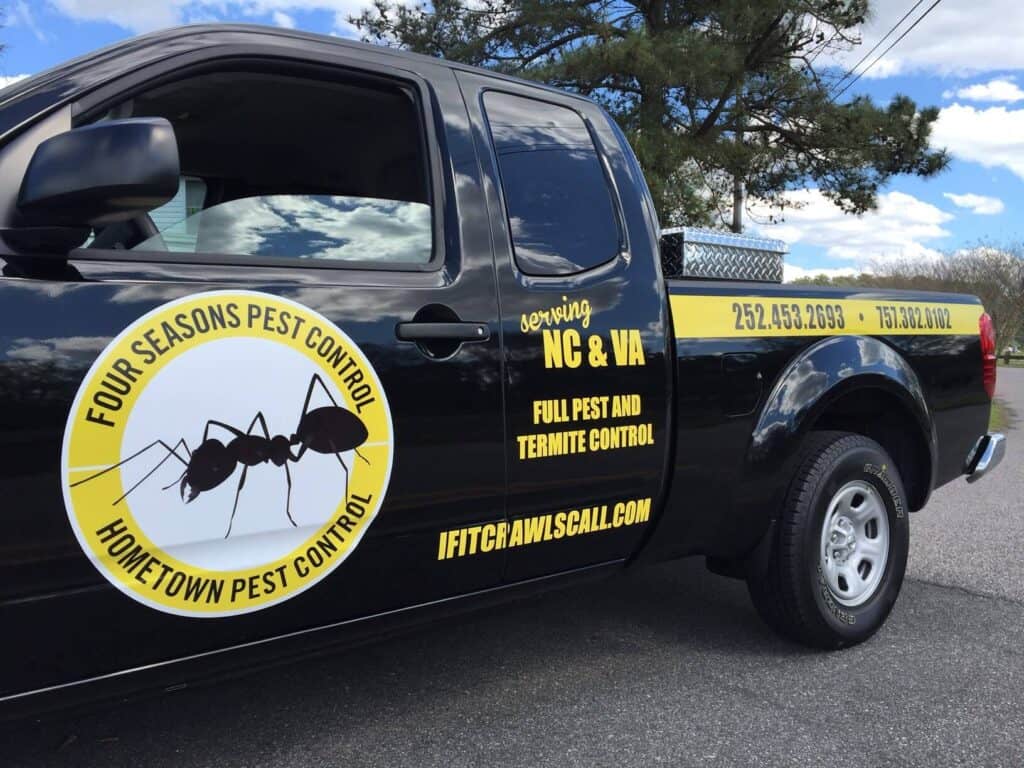 Pest control truck graphics installed