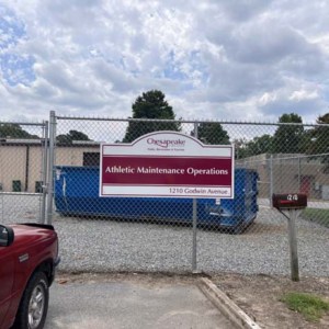 Signs installed on chain link fence from DeSigns, Inc. for signs, banners, wraps, and promotional products.