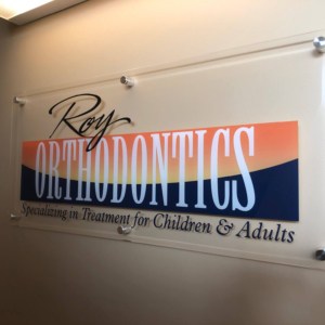Logo signage designed and mounted for your office. Call DeSigns, Inc.