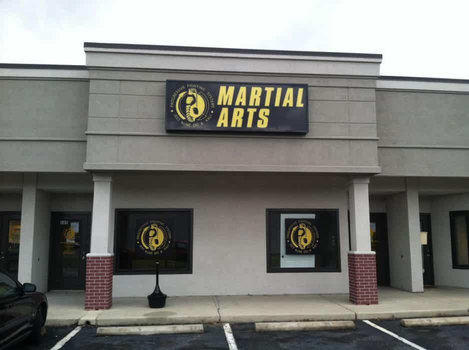 Storefront sign with window-graphics for Martial Arts