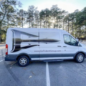 Get lettering and graphics for your company van or truck from DeSigns, Inc.