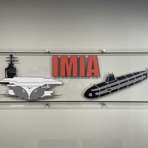 Acrylic wall signs. Interior wall plaques with lettering for IMIA