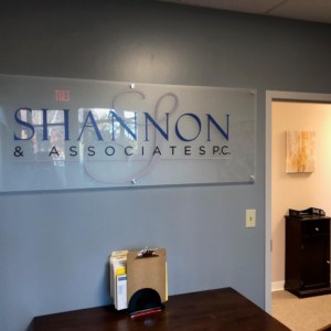 Etched plexiglass interior lobby signs by DeSigns, Inc.