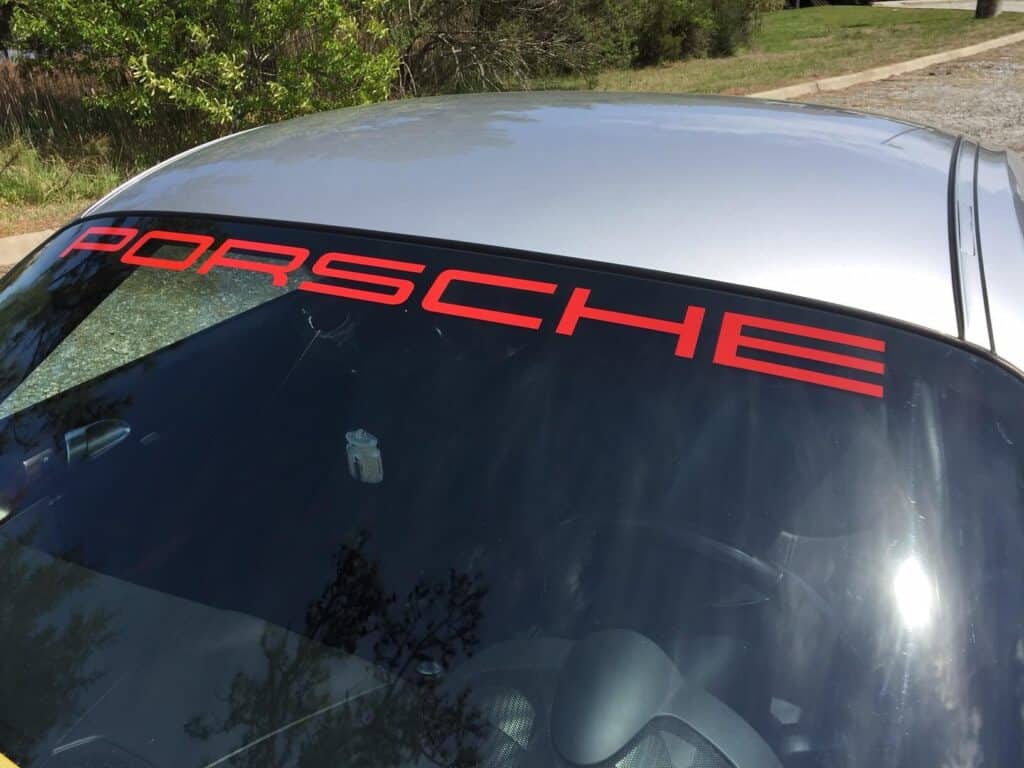 Rear window lettering on auto glass on Porsche